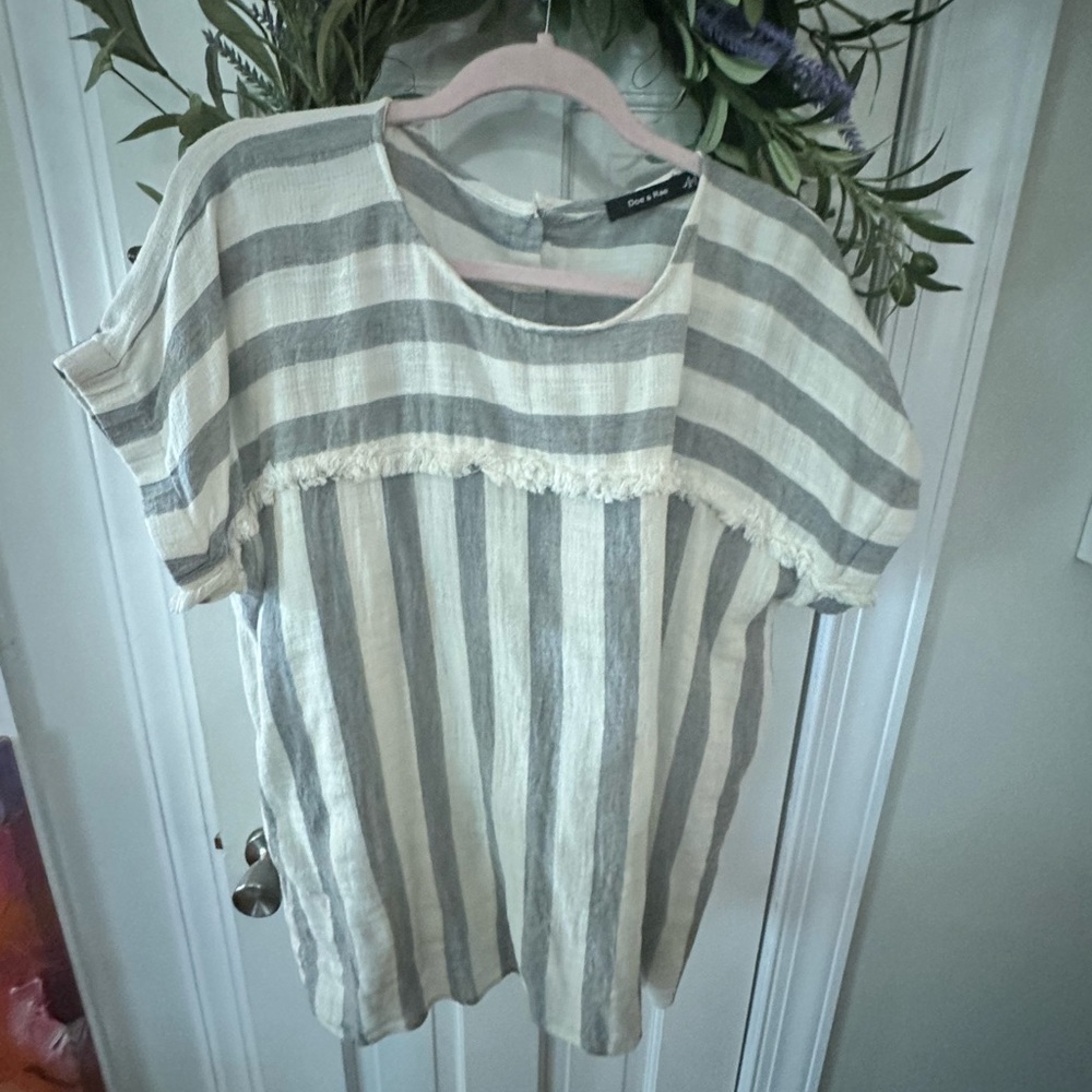 Gray and cream linen like top with stripes. Button closure on top of back